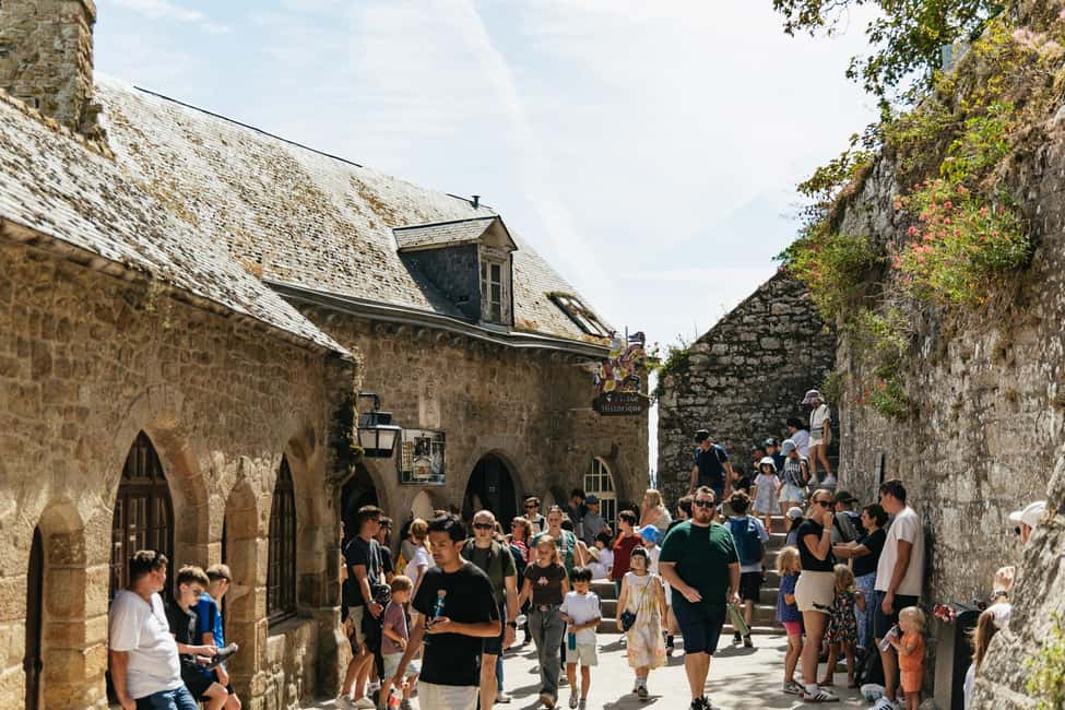 Day Trip to Mont-Saint-Michel from Paris - Arriving at Mont-Saint-Michel: shuttles, gates, and first impressions
