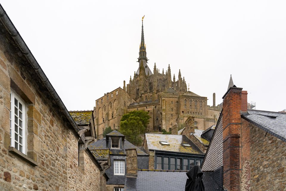 From Paris: Mont Saint Michel Day Trip with a Guide - The Coach Ride to Normandy: Comfort, Breaks, and On-the-Road Stories