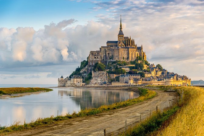 Mont Saint Michel Guided Day Trip with Abbey Entry from Paris - Fortifications du Mont-Saint-Michel: Pilgrim Steps and Atlantic Views