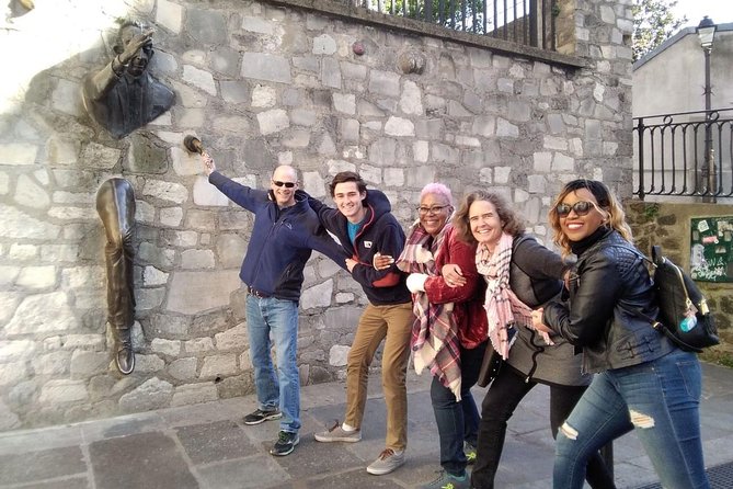 Montmartre Hidden Gems and Scenic Highlights Walking Tour - Dalida’s bronze bust and the peaceful square break