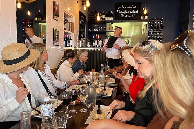 Montmartre Hill French Gourmet Food and Wine Tasting Walking Tour - Place du Tertre: Artists’ Corner and the Montmartre Center Pulse
