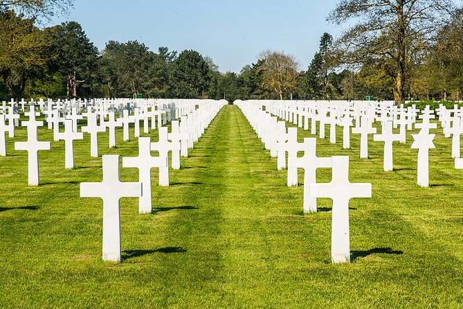 Normandy D-Day Beaches and American Cemetery Day Trip from Paris - Pointe du Hoc: Rangers, cliffs, and the ground-level impact