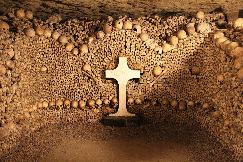 Paris: Catacombs Entry & Seine River Cruise with Audio Guide - Your Walk Through the Catacombs: Self-Guided at Your Pace
