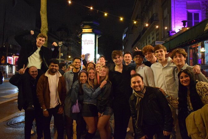 Paris: City Center Guided Pub Crawl with Shots & Club Entry - The Porte-Saint-Denis photo stop: A quick break from bar mode