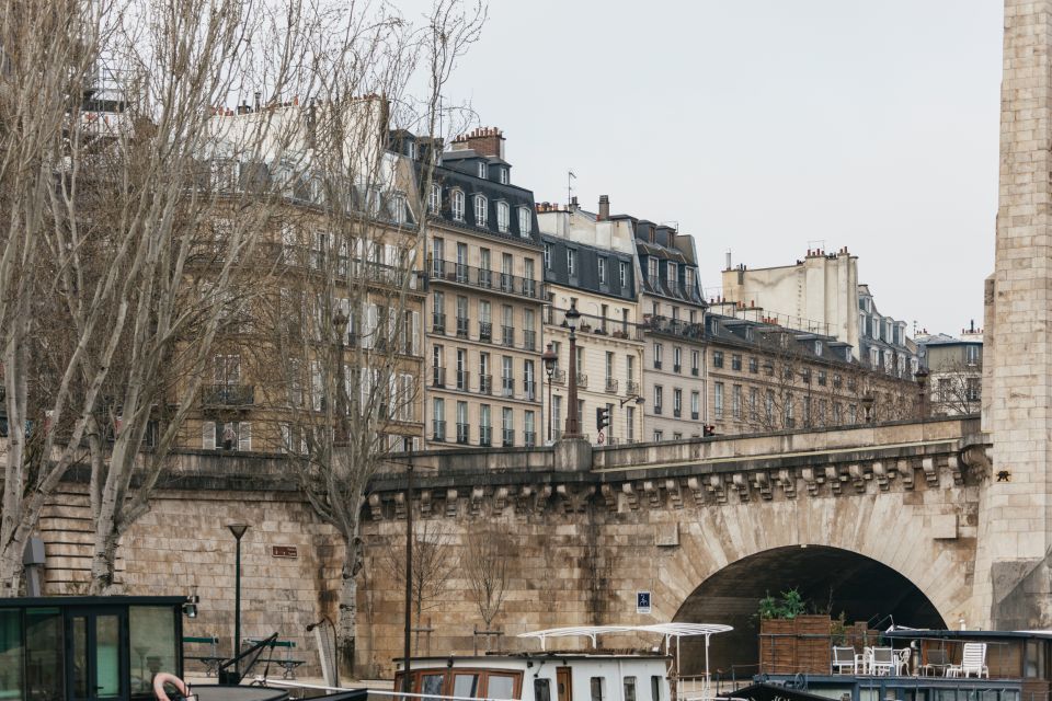 Paris: Cruise on the Saint-Martin Canal and the Seine River - Entering the Seine: Île Saint-Louis, Île de la Cité, and the Notre Dame viewpoint