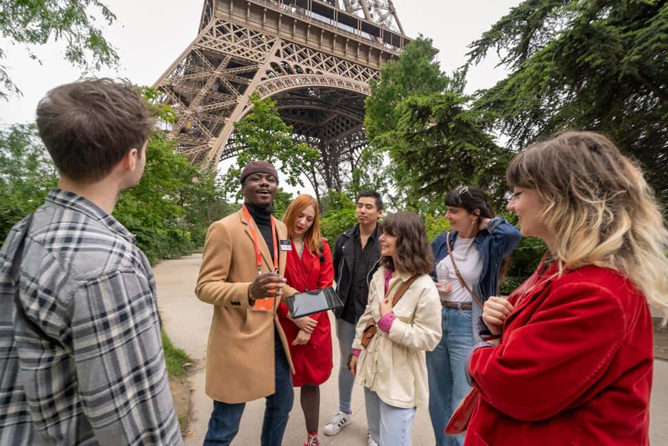 Paris: Eiffel Tower Guided Tour with Summit Access - The live guide stories: why this feels different from a self-guided visit