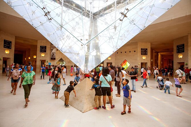 Paris: Louvre Museum Tour Mona Lisa & Iconic Masterpieces - Meeting at Kiosque des Noctambules instead of the Louvre entrance