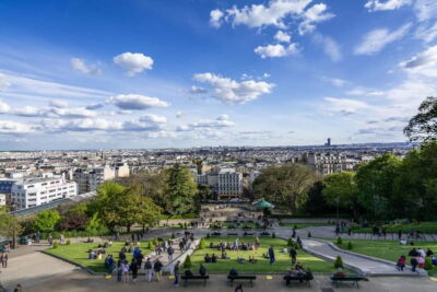 Paris: Montmartre Highlights Walking Tour with a Local Guide - Place Saint-Pierre under Sacré-Cœur: setting the scene from the top
