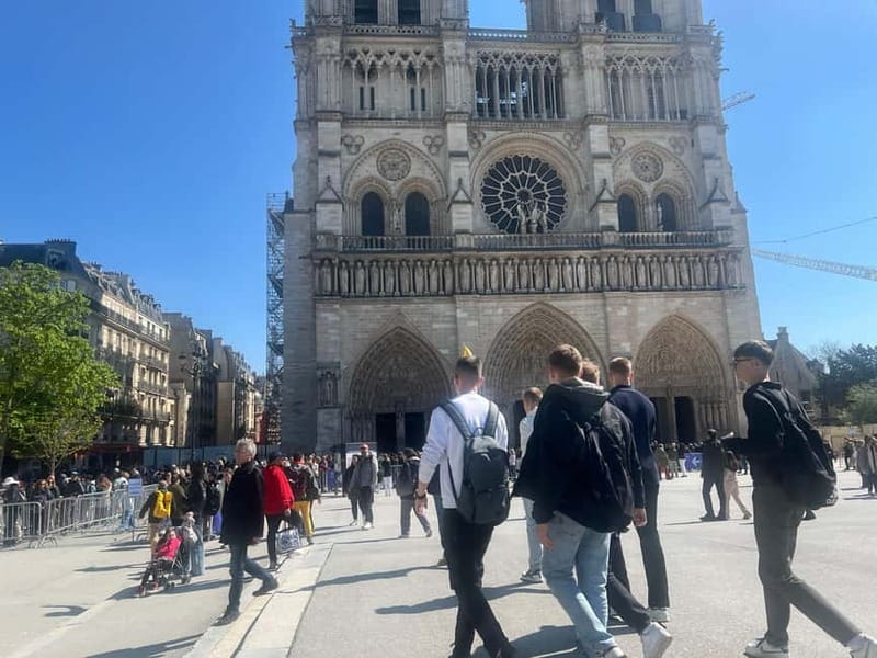Paris: Notre-Dame Cathedral Exterior Tour & Free Entrance - The 2019 fire story and what restoration means (listen for the details)